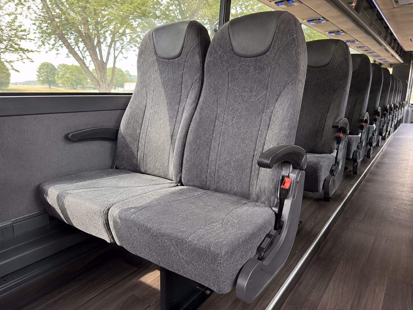how seasonality and peak times affect charter bus rates in newton massachusetts